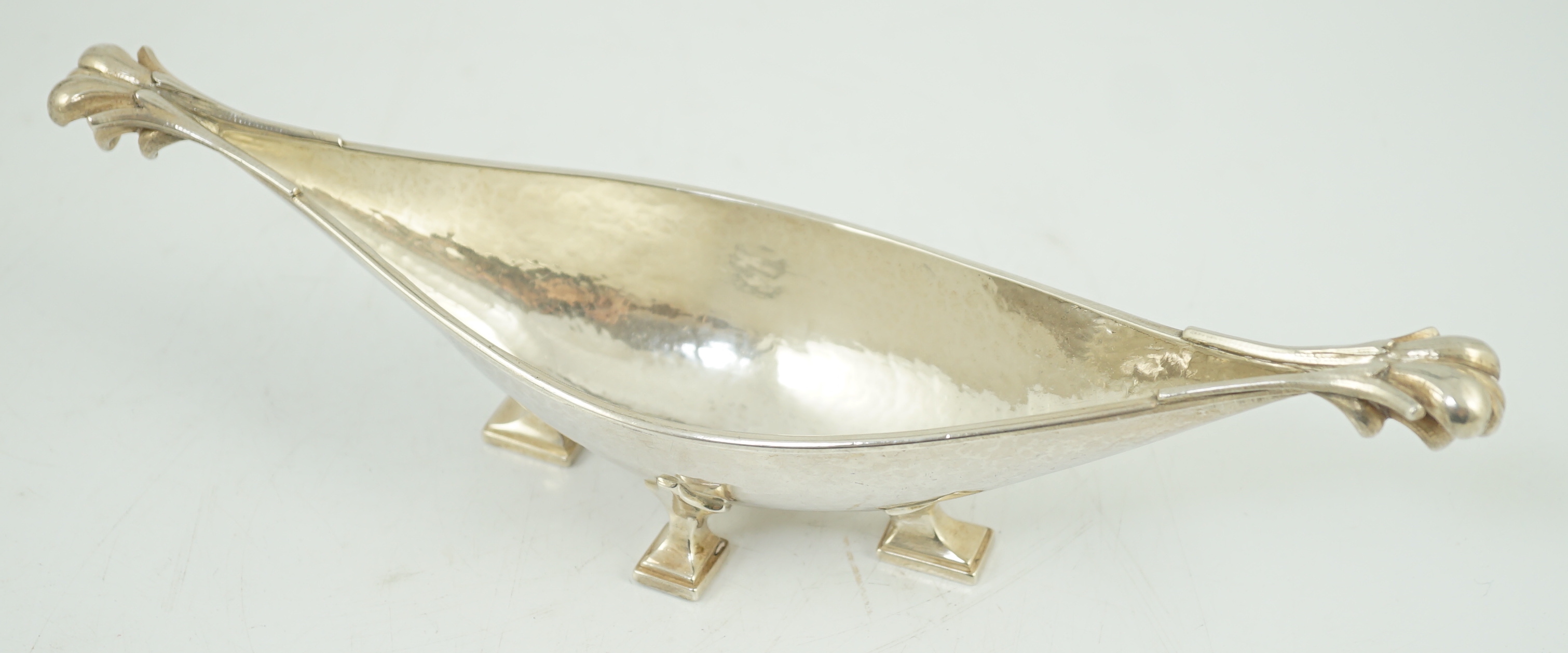 A George V Arts & Crafts planished silver boat shaped dish, by Omar Ramsden